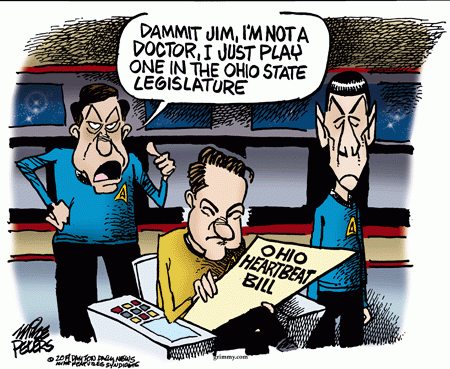 Kirk, Spock, and Bones on the bridge of the starship Enterprise.  Kirk holds the Ohio Heartbeat Bill.  Bones says, 